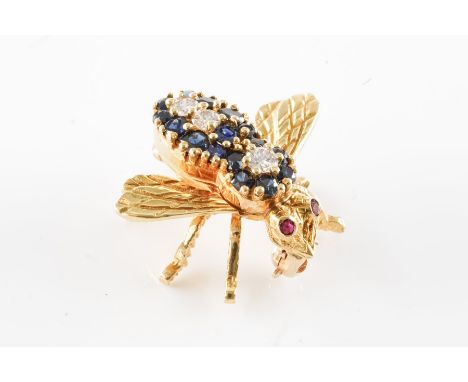 A SAPPHIRE AND DIAMOND INSECT BROOCHIn the form of a fly, set with three round brilliant cut diamonds, surrounded by sixteen 