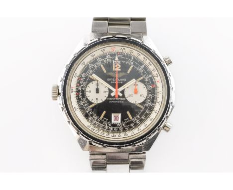 A BREITLING NAVITIMER AUTOMATIC STEEL GENTLEMAN'S BRACELET WRISTWATCHWith a signed black and silvered dial, two subsidiary di