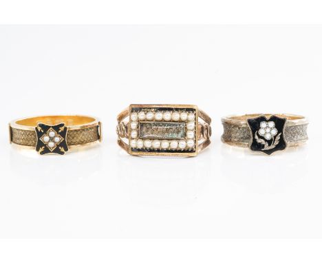 THREE 19TH CENTURY MOURNING RINGS (3)One with four panels of black enamel, fully hallmarked 18ct London 1888, inscribed 'Beat