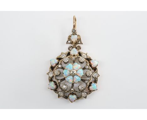 A VICTORIAN OPAL AND DIAMOND PENDANT BROOCHSet with six heart shaped opals at the center, six heart shaped opals to the borde