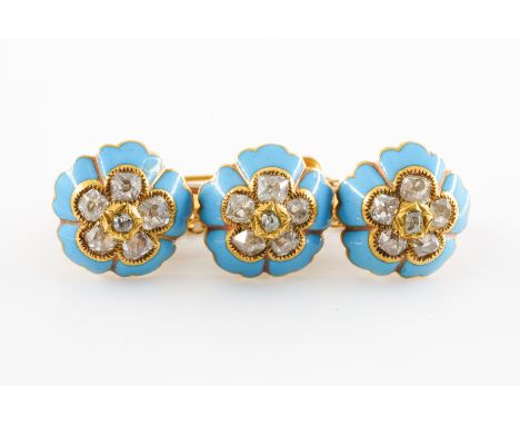 A VICTORIAN ENAMEL AND DIAMOND BAR BROOCHFeaturing three flowers, each set with old mine cut diamonds and blue enamel, in unm