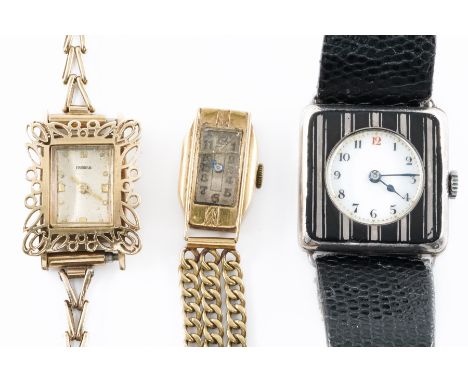 THREE WRISTWATCHES (3)Comprising; a Tourneau gold rectangular cased lady's wristwatch, with a signed jewelled movement, detai