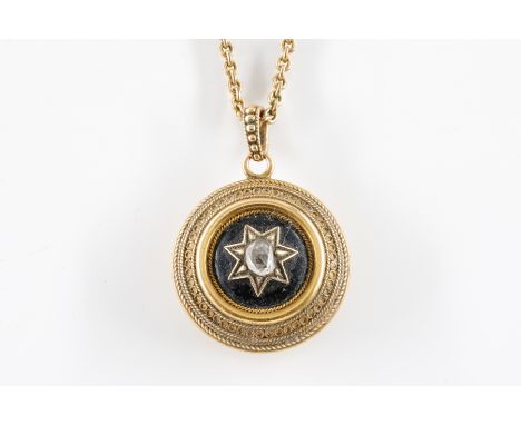 A VICTORIAN DIAMOND SET MOURNING NECKLACE AND CHAINFeaturing a locket, with a star motif with an old mine cut diamond to the 