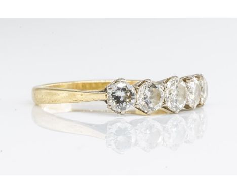 A DIAMOND FIVE STONE RINGFeaturing five round brilliant cut diamonds, in a claw setting (total diamond weight 1.50 carats) in