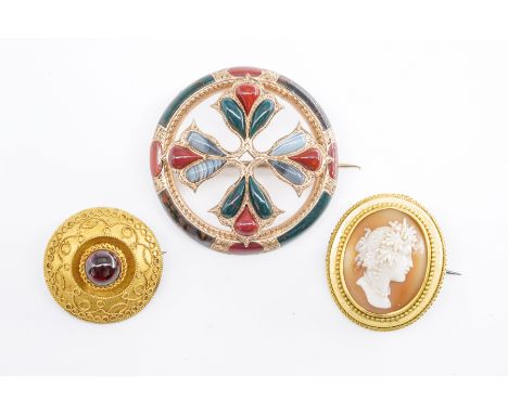 THREE VICTORIAN BROOCHES (3)Comprising; a bloodstone, jasper and varicoloured agate circular brooch, with a central cruciform