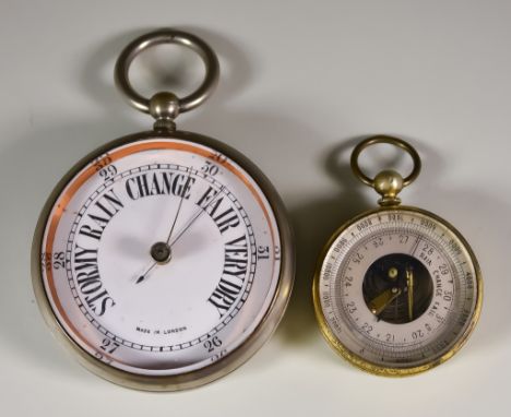 An English Pocket Barometer with Open Face, Late 19th Century, with 1.75ins engraved silvered dial, in brass case, and a silv