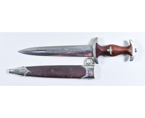 A German World War II NSKK Dagger, Trident with indistinctive signature , 9ins double edge bright steel blade, etched "Ulles 