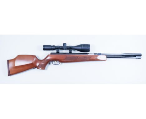 A .22 Under Lever Air Rifle, by Weihrauch, model HW97K, 14.5ins blued steel barrel with integral sound moderator, blued steel