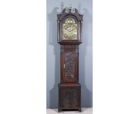 A Late 18th Century Oak Longcase Clock, by Grindall of Dumfries, 14.5ins arched brass dial with Roman and Arabic numerals, su