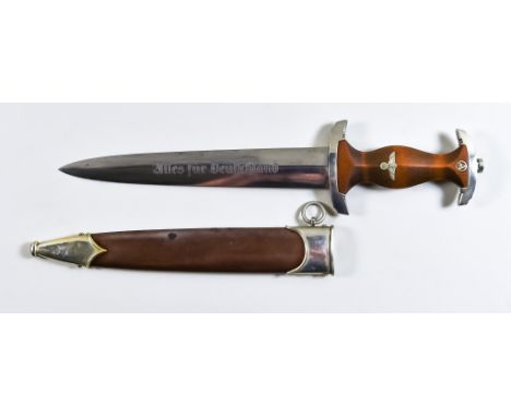 A German World War II NSKK Dagger, by Carl Eickhorn , 9ins double edge bright steel blade, etched "Ulles fur Deutschland" har