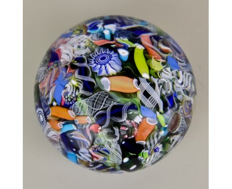 A St. Louis Scramble Millefiori Paperweight, Circa 1850, with jumble of ribbons, coloured filigree, latticinio and incomplete