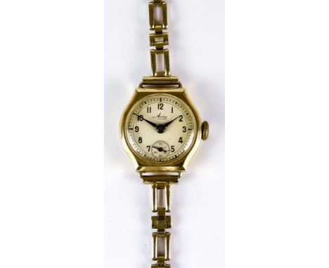 A 20th Century Lady's Manual Wind Wristwatch, by Avia, 9ct gold case, 26mm diameter, white dial with Arabic numerals and subs