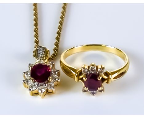 A Ruby and Diamond Suite, Modern, comprising - 18ct gold ring set with a centre ruby approximately .50ct, surrounded by six s