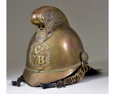 A Fireman's Brass Merryweather Pattern Helmet, Early 20th Century, with badge for Canterbury (?) Fire Brigade, 10ins highCond