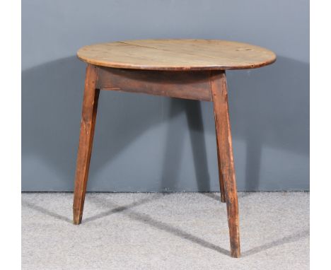 A Late George III Elm Circular Cricket Table with two plank top, on triform base with splayed legs, 30ins diameter x 28ins hi