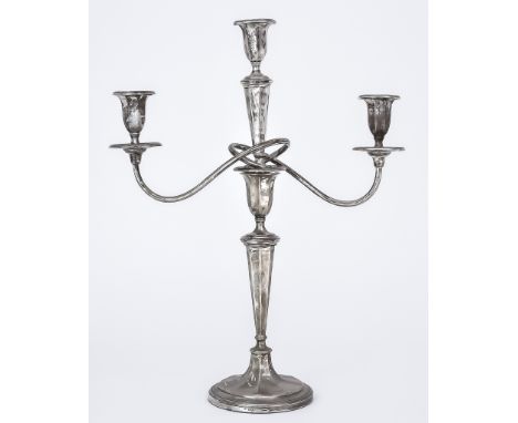 A George V Silver Three Light Candelabra, by Walter Latham &amp; Son, Sheffield, 1920, of octagonal tapered form with reeded 