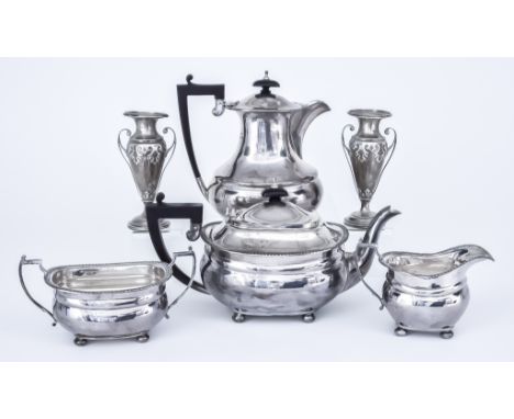 An Elizabeth II Silver Rectangular Four-Piece Tea Service and a Pair of Edward VII Silver Two-Handled Vases, the tea service 