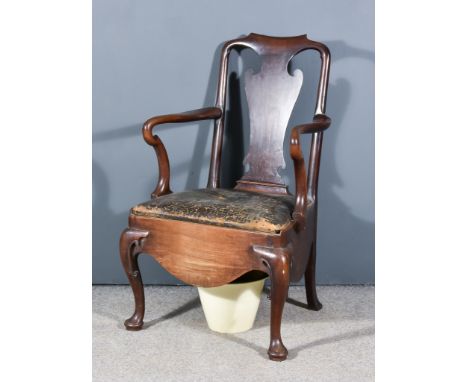 A George III Mahogany Commode Armchair with slightly shaped crest rail, solid vase pattern splat, shaped arms, drop-in seat u