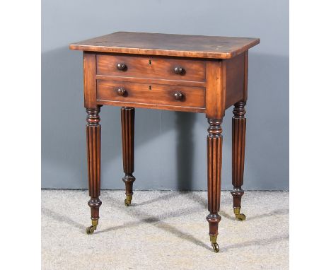 A William IV Mahogany Rectangular Worktable with Crossbanded Top, opening to reveal divided interior, fitted two dummy frieze
