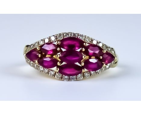 A Ruby and Diamond Ring, Modern, 14ct gold set with nine faceted ruby stones, approximately 2ct total, surrounded by small br