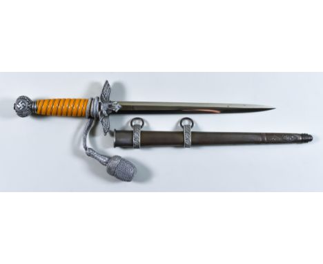 A German World War II Luftwaffe Dagger, by Weyesberg,  type two, 10ins double edged bright steel blade, celluloid grip, silve