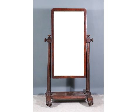 A 19th Century Mahogany Framed Rectangular Cheval Mirror, inset with plain mirror plate with turned and moulded uprights and 
