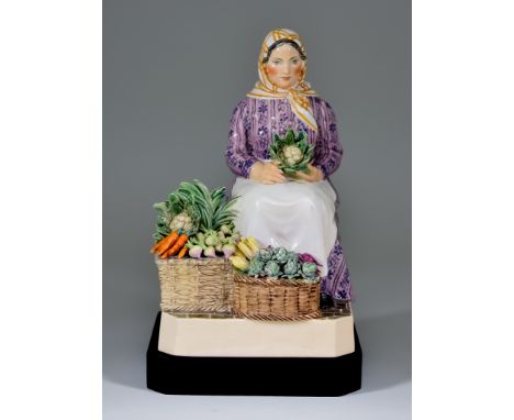 A Charles Vyse Pottery Figure -"Market Day Boulogne - Vegetables", circa 1931, modelled as a seated lady holding a cauliflowe