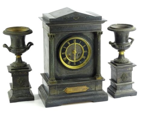 A late 19thC French black slate and metal marble clock, the clock itself modelled in the form of a temple or portico with ree