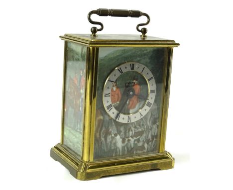 An Acctim brass carriage clock, decorated with hunting scenes, 13cm H.