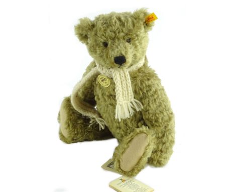 A Steiff 1920 classic teddy bear, with scarf and growler, original tags, 39cm H.