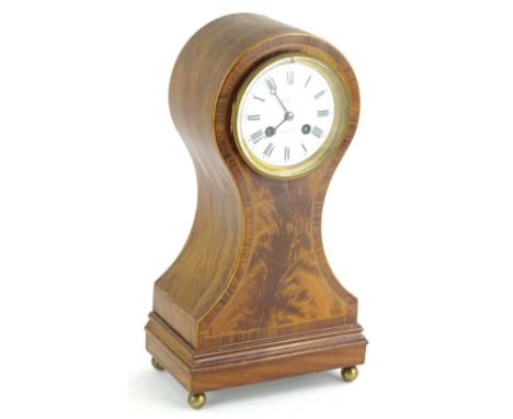 A late 19thC mahogany boxwood and ebony strung mantle clock, the enamel dial signed Wilson Penrith, in balloon shaped case on