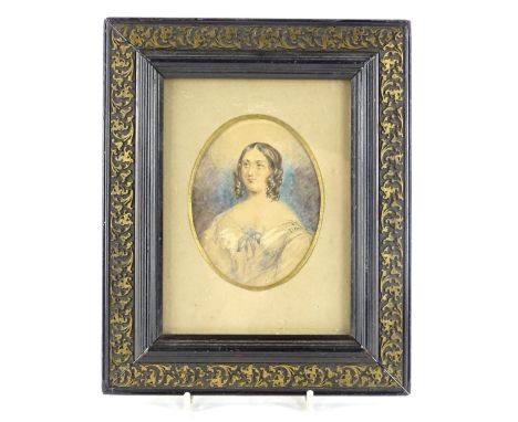 C.E.W (19thC), Portrait miniature of a lady wearing an ivory coloured dress with blue bow, watercolour, oval, 11cm x 8cm, ins