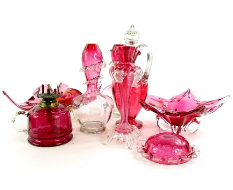 A collection of cranberry tinted glass, to include two Czech pieces, decanter and stopper, candlestick, pair of vases with pe