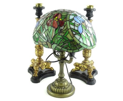 A modern Tiffany style desk lamp, the stained glass shade decorated with flowers etc., on a brassed base, 47cm H and a pair o