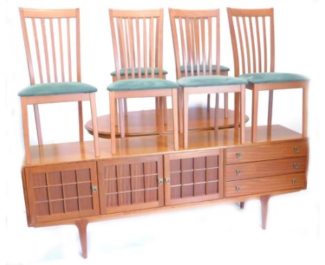 A retro style teak low sideboard, with an arrangement of three frieze drawers and three doors, each with lattice design on ta