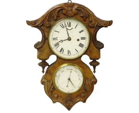 A Victorian walnut clock and barometer, the case carved with scrolls and with drop finials, with two enamel dials (AF), 43cm 