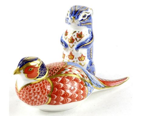 A Royal Crown Derby Imari porcelain paperweight, modelled in the form of a squirrel, gold button to underside, and a similar 