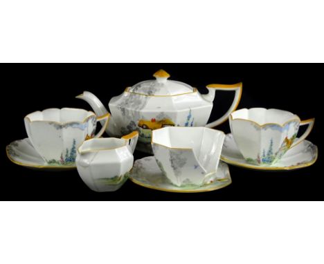 A Shelley porcelain part tea service, printed and painted with a thatched cottage, country garden etc., pattern number 12988.