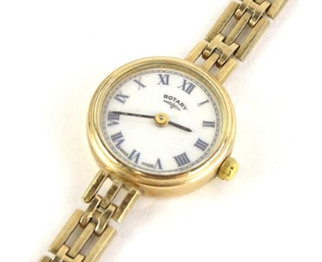 A 9ct gold Rotary ladies wristwatch, with small circular dial, with cream dial, on three row gold bracelet, 15g all in. 