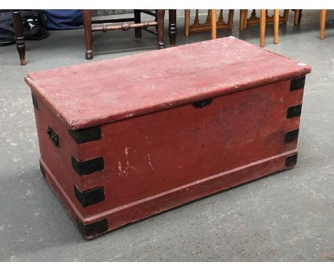 A red painted pine travel trunk with metal bracing, 84x44x39cmH 