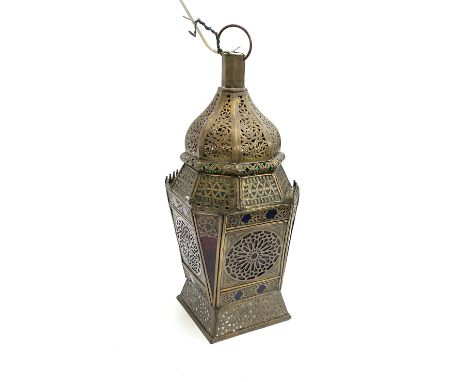 An eastern pierced metal and coloured glass lantern, fitted for electricity, 52cmH 