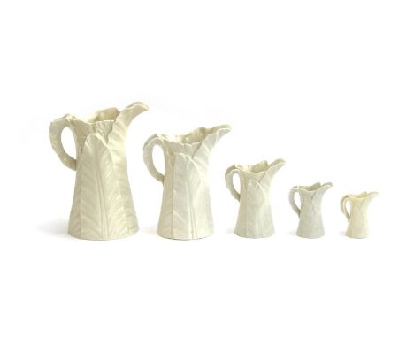 A set of five graduating Royal Worcester banana leaf jugs 