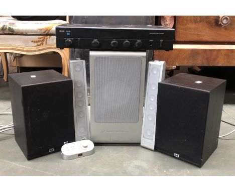 An Altec Lansing audio system powered subwoofer, with matching speakers, with an Racam Alpha II stereo amplifier, and a pair 