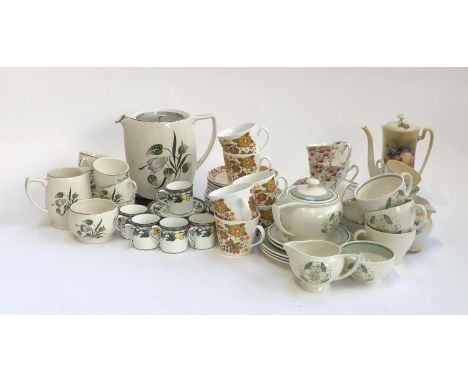 A mixed lot of teawares to include a Susie Cooper part tea service, a set of six Adderley's coffee cans and saucers, a Russel