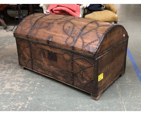 A domed and studded storage trunk, 101cmW 