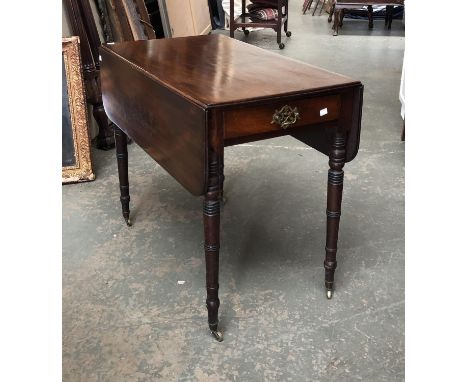 A Regency mahogany Pembroke table with single drawer, on tapering ring turned legs and brass casters, 84x49x71cmH 