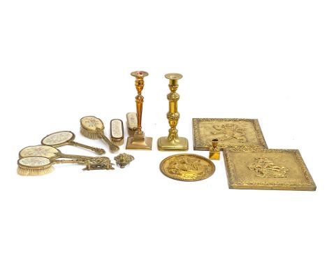 A mixed lot of metal items to include brass candlesticks; brass plaques; brass Art Nouveau style knocker etc 
