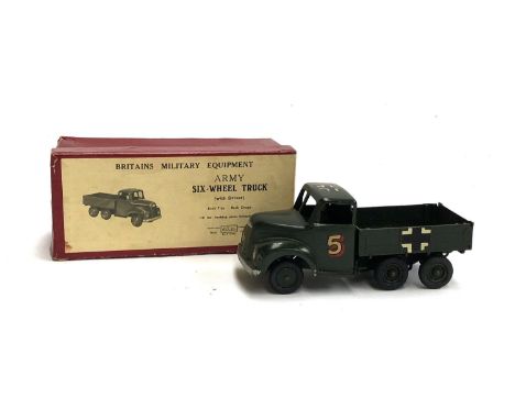 A Britains military equipment Army six wheel truck with driver, no. 1335, boxed 