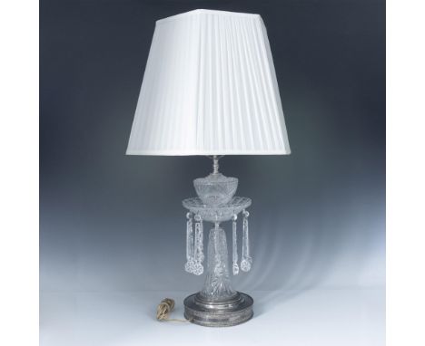 Scalloped glass lamp, does not include lampshade. Decorated with cut and etched starburst glass pendants. Features a rotary s