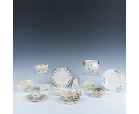 Amazing collection of hand painted dishes that consists of a basketweave textured teacup and saucer, a basketweave textured c